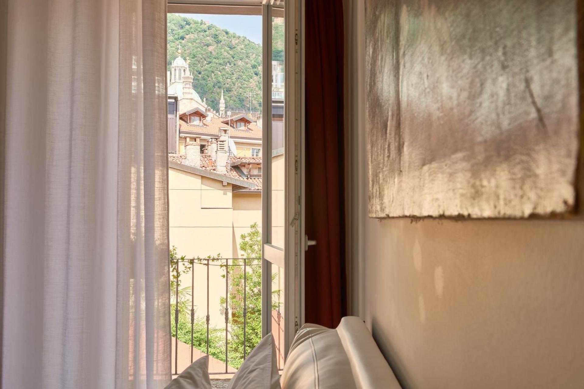 23 Lake Sweet Home Como Bagian luar foto